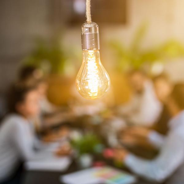 Lightbulb over a conference room table