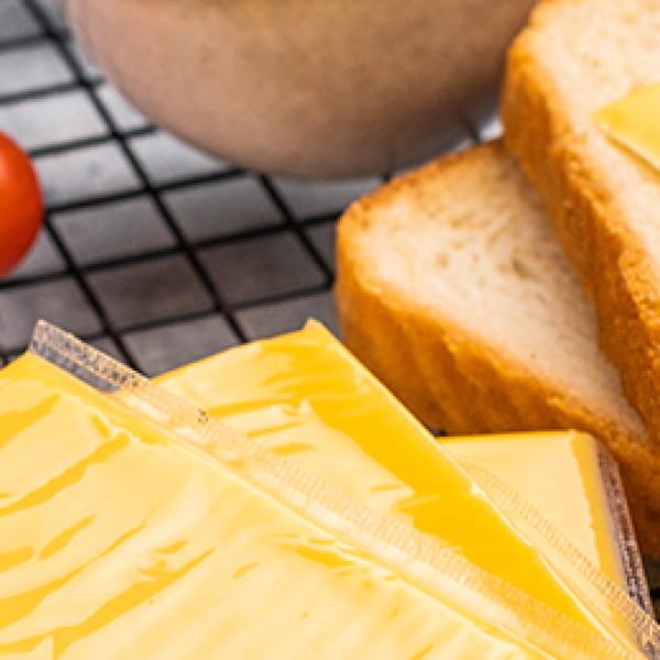 sliced cheese with baby tomatoes