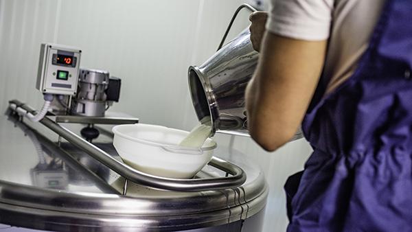 baker mixing yoghurt