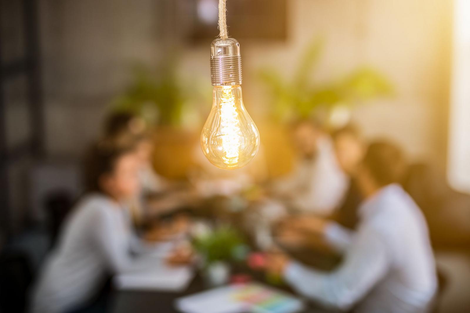 Lightbulb over a conference room table