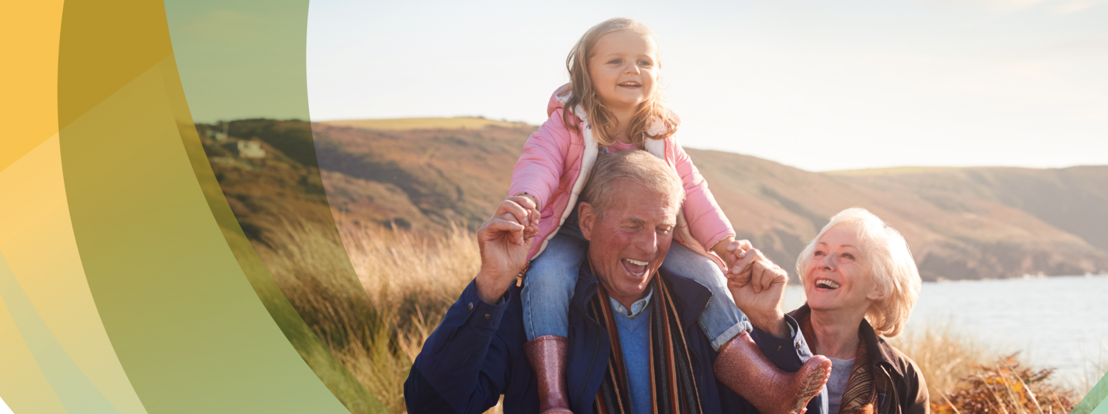 image of grandparents and grandchild on a walk