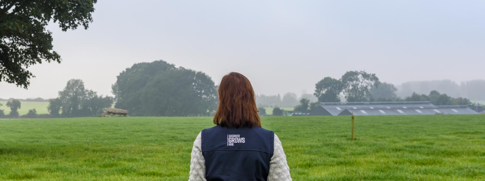 image of a female farmer in a field